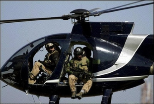 Helicóptero de Blackwater en Iraq, onde a empresa tivo a maior base militar privada do planeta