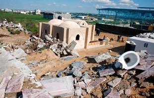 Casa reconstruída, entre os cascallos do masacre de Gaza de 2009, coa axuda da UNRWA