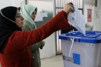 Unha muller vota en Ammán