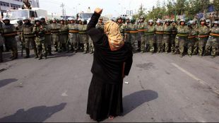 Os uigur representan arredor do 30% da poboación, por un 70% dos han